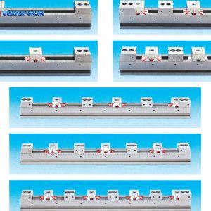 Ê tô dãy VERTEX VFL gá nhiều phôi trên một ray, mũi tên chỉ hàm cố định hai chiều